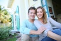 Middle-aged couple sitting in the garden Royalty Free Stock Photo