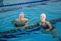 Middle Aged Couple In Swimming Pool Royalty Free Stock Photo