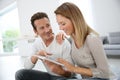 Middle-aged couple with tablet Royalty Free Stock Photo