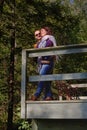 middle-aged couple, tourists looking at the open spaces, a middle-aged couple rejoices at the warm rays of the sun in