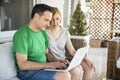 Middle Aged Couple Using Laptop Computer and Having Fun Royalty Free Stock Photo