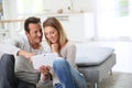 Middle-aged couple websurfing with tablet Royalty Free Stock Photo