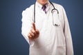 Middle aged doctor gesturing with copy space Royalty Free Stock Photo