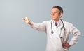Middle aged doctor gesturing with copy space Royalty Free Stock Photo