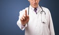 Middle aged doctor gesturing with copy space Royalty Free Stock Photo