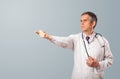 Middle aged doctor gesturing with copy space Royalty Free Stock Photo