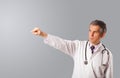 Middle aged doctor gesturing with copy space Royalty Free Stock Photo