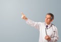 Middle aged doctor gesturing with copy space Royalty Free Stock Photo