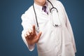 Middle aged doctor gesturing with copy space Royalty Free Stock Photo