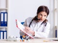 Middle-aged female doctor in telemedicine concept Royalty Free Stock Photo