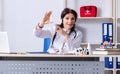 Middle-aged female doctor in telemedicine concept Royalty Free Stock Photo