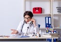 Middle-aged female doctor in telemedicine concept Royalty Free Stock Photo