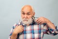 Middle aged hairdresser man. Barber scissors and straight razor hair clipper, Vintage barber shop, shaving. Portrait old