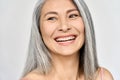 Happy laughing middle aged mature asian woman portrait. Antiaging skincare ads. Royalty Free Stock Photo