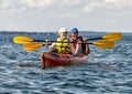 Middle-aged husband and wife enjoying a kayaking adventure in the Atlantic Ocean near Bar Harbor, Maine. Royalty Free Stock Photo