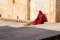 middle-aged indian womam wearing traditional indina sari (also saree or shari) in Amber fort, India