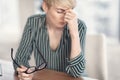 Middle Aged Lady Holding Eyeglasses Massaging Nosebridge Sitting In Office Royalty Free Stock Photo