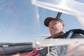 middle-aged man in cockpit sailplane Royalty Free Stock Photo