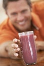 Middle Aged Man Drinking Fresh Berry Smoothie Royalty Free Stock Photo