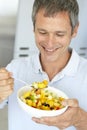 Middle Aged Man Eating Fresh Fruit Salad Royalty Free Stock Photo