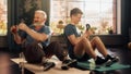 Middle Aged Man Exercising at Home with Personal Trainer. Senior Male Strengthening Muscles with