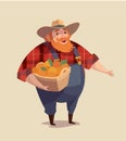 Middle aged man-farmer wearing denim with bucket of fruits.