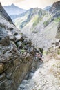 Middle aged man hiking and climbing mountains. Royalty Free Stock Photo