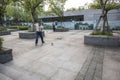 Middle-aged man playing gyro at Xuanwumen Square Royalty Free Stock Photo