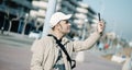 Modern middle-aged man having a video call outdoor Royalty Free Stock Photo