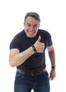 Middle-aged man wears black t-shirt. He is gesturing with his th Royalty Free Stock Photo