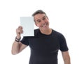 Middle-aged man wears black t-shirt. He holds the sign next to h Royalty Free Stock Photo