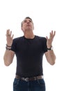 Middle-aged man wears black t-shirt. He thanks and looks up. Royalty Free Stock Photo