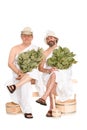 Middle-aged men in Russian sauna bathing costumes Royalty Free Stock Photo