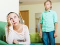 Middle-aged mother and teenager son after quarrel Royalty Free Stock Photo