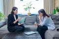 Middle aged sad woman at mental therapy in modern office, talking to psychologist Royalty Free Stock Photo