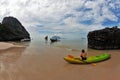 Middle-aged tourist photographs of the boats