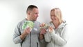 a middle-aged wife asks her husband for money to buy dollars and euros, the husband takes a part of it, the wife counts