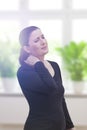 Middle aged woman acute neck pain Royalty Free Stock Photo