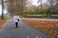 Middle-aged woman in autumn park