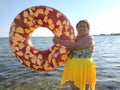 Middle-aged woman with a buoy