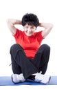 Middle-aged woman doing sit-ups Royalty Free Stock Photo