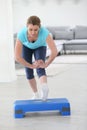 Middle-aged woman excercising at home Royalty Free Stock Photo