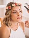 Middle-aged woman getting makeup done by a professional Royalty Free Stock Photo