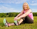 Middle-aged woman in her 40s stretching Royalty Free Stock Photo