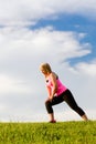 Middle-aged woman in her 40s stretching Royalty Free Stock Photo