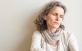 Middle aged woman looking pensive Royalty Free Stock Photo