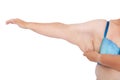 Middle aged woman with sagging excess arm skin after extreme weight loss. Front view full right arm holding excess skin