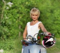 Middle aged woman on scooter