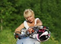 Middle aged woman on scooter