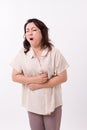 Middle aged woman suffering from stomach ache, belly pain Royalty Free Stock Photo